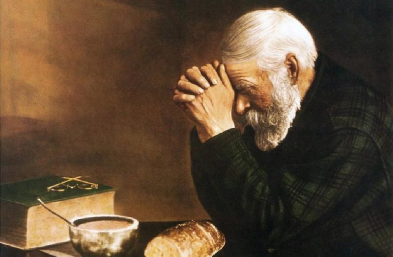 Unser tägliches Brot gib uns heute. Old Man Praying